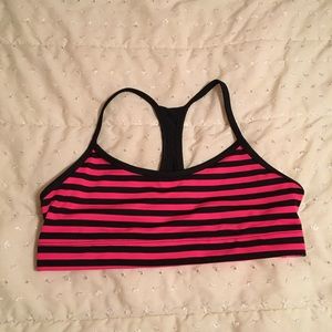 NWOT Bright pink and black stripped sports bra
